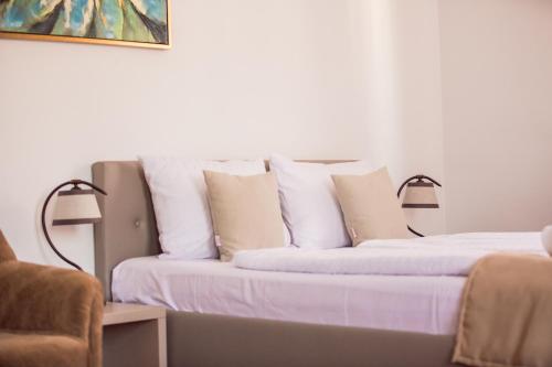Katil atau katil-katil dalam bilik di Simar Bed & Coffee Guesthouse
