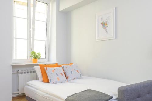 Posteľ alebo postele v izbe v ubytovaní Bright and modern apartment in the heart of the Old and New Town