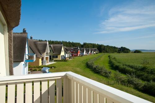 a view from a balcony of a row of houses at Ferienhaus - Huus Holm in Breege