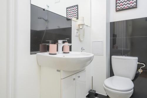 Kúpeľňa v ubytovaní Bright and modern apartment in the heart of the Old and New Town