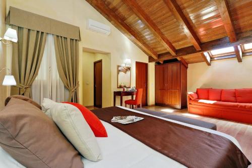 Voodi või voodid majutusasutuse Hotel Camelia toas