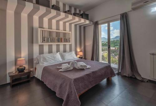 A bed or beds in a room at BnB Casa Rossa