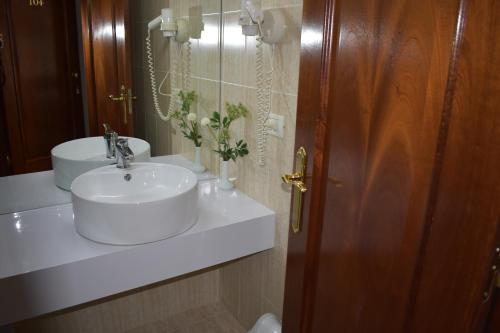 Koupelna v ubytování Hotel Arvi