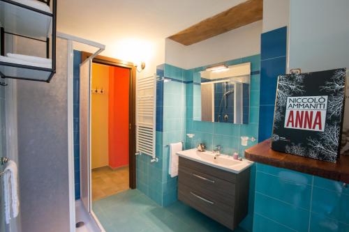 Ein Badezimmer in der Unterkunft La Fontana di Rua Catalana