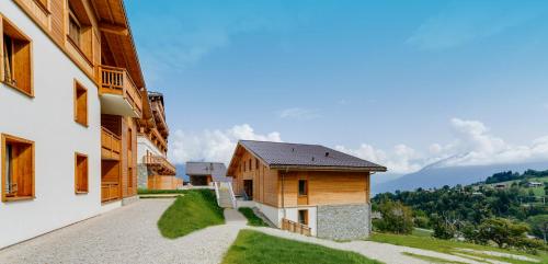 a view from the courtyard of a building at TERRESENS - Les Fermes du Mont-Blanc in Combloux