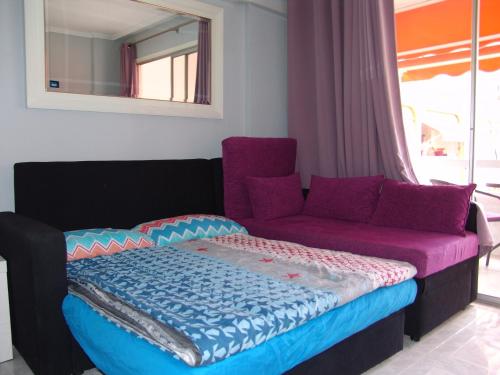 Un pat sau paturi într-o cameră la Apartament Dune Atlantic