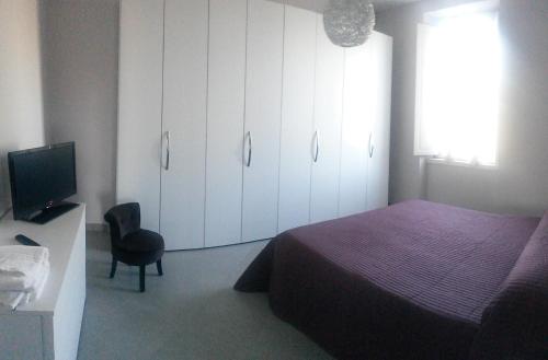 Giường trong phòng chung tại Suite La Dolce Vita
