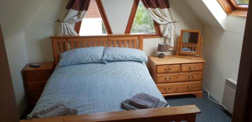 Postel nebo postele na pokoji v ubytování Lake Dathee Lodge