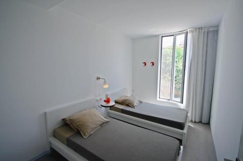 Ένα ή περισσότερα κρεβάτια σε δωμάτιο στο El Descanso - sea view villa with private pool in Benissa