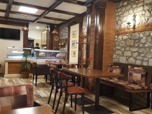A restaurant or other place to eat at Vila Dante Boutique Hotel