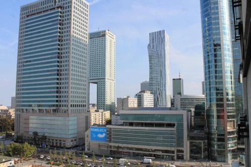 a city skyline with tall buildings and a freeway at My Beloved Warsaw City Center - NETFLIX in Warsaw