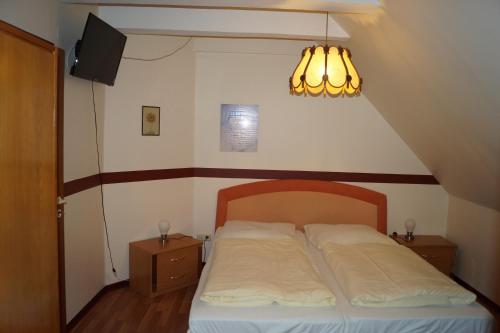 Postel nebo postele na pokoji v ubytování La Fontana