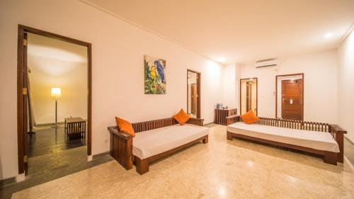 Postel nebo postele na pokoji v ubytování NDC Resort & Spa