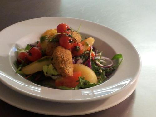 a white bowl of food on a table at Blarney Castle Hotel in Blarney