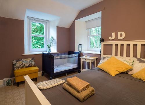 Ένα ή περισσότερα κρεβάτια σε δωμάτιο στο Lovely house next to Euchan River