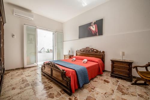 Posteľ alebo postele v izbe v ubytovaní Carlentini house B&B
