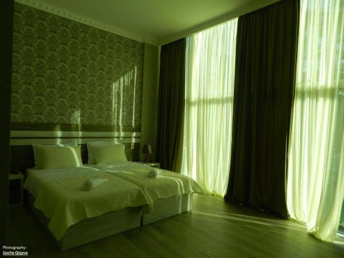 Postel nebo postele na pokoji v ubytování Resort Martvili