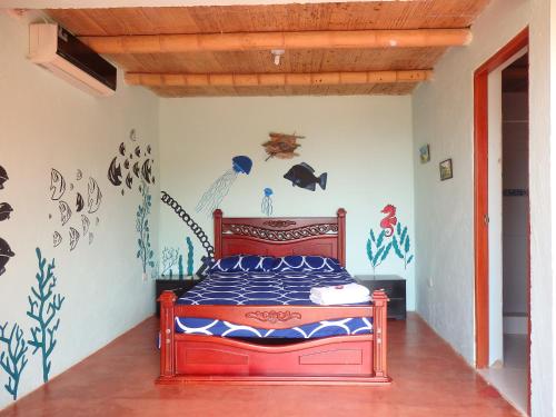 Postel nebo postele na pokoji v ubytování Hostal Casa Horizonte