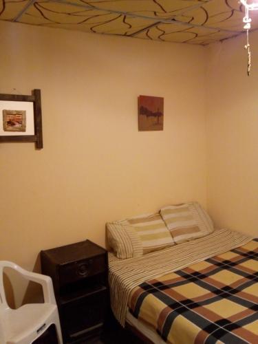 Postel nebo postele na pokoji v ubytování Tilcara Mistica Hostel