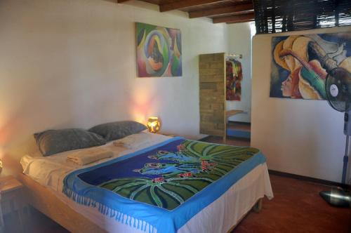 Ένα ή περισσότερα κρεβάτια σε δωμάτιο στο Hostel La Ballena Backpacker