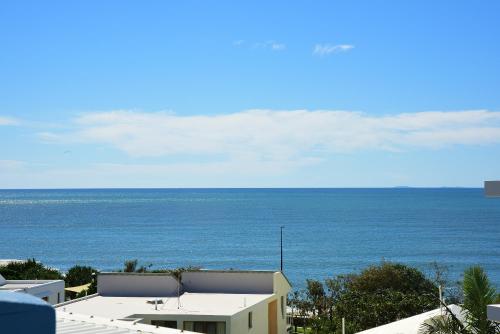 a view of the ocean from a building at Lindomare Apartments in Caloundra