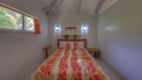 Una cama o camas en una habitación de Tropical Sands