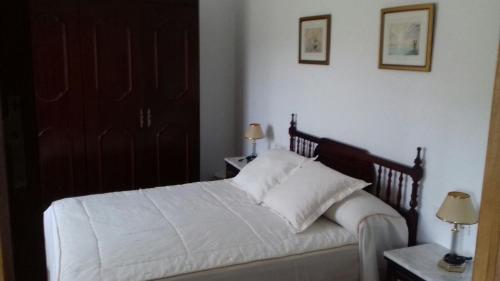 A bed or beds in a room at Casa Paquita Y Telesforo