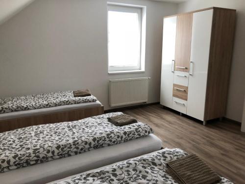 Giường trong phòng chung tại Privat Michalek