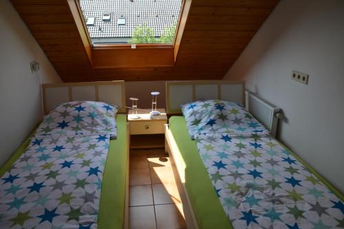 Uma cama ou camas num quarto em Ferienwohnung Margit
