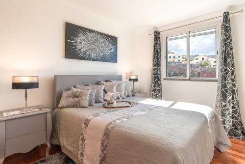 Ένα ή περισσότερα κρεβάτια σε δωμάτιο στο Zeza´s apartament