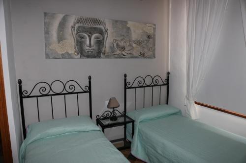 Ένα ή περισσότερα κρεβάτια σε δωμάτιο στο Casa El Molino