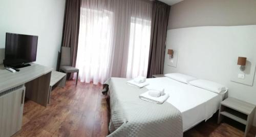 B&B Erifrà Piccolo Hotelにあるベッド