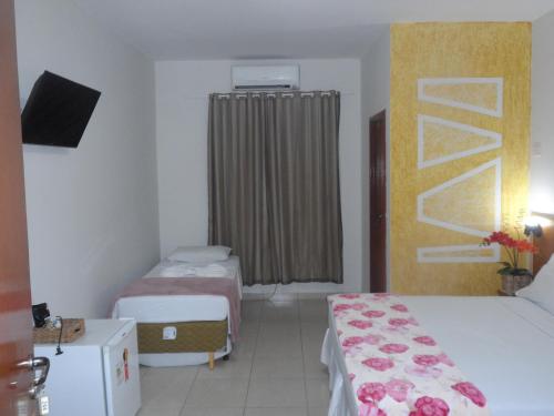 Nioja Hotelにあるベッド