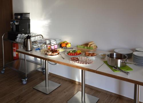 a table with food on top of it at Na Zeleném statku in Rašovice