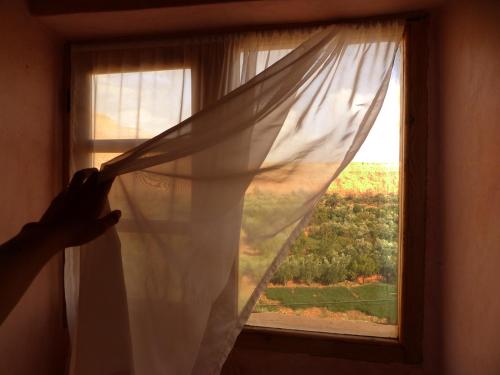 a person is at Auberge Ayouze in Aït Ben Haddou