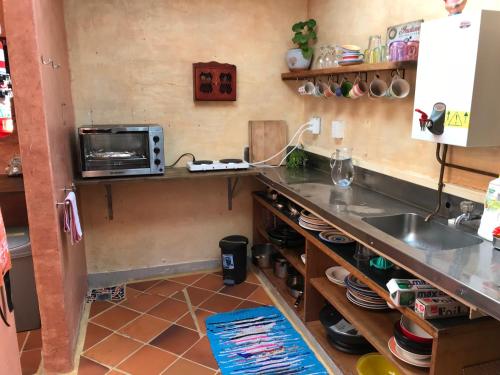 
A kitchen or kitchenette at The Cell Block Backpackers

