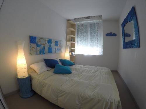 Cama o camas de una habitación en APARTAMENTO GEORGE V T2 plus Alcôbe