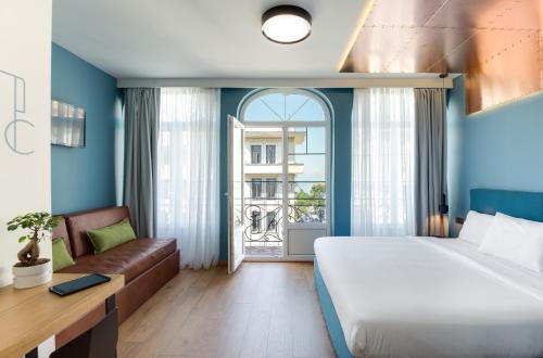 Postel nebo postele na pokoji v ubytování Colors Urban Hotel Thessaloniki