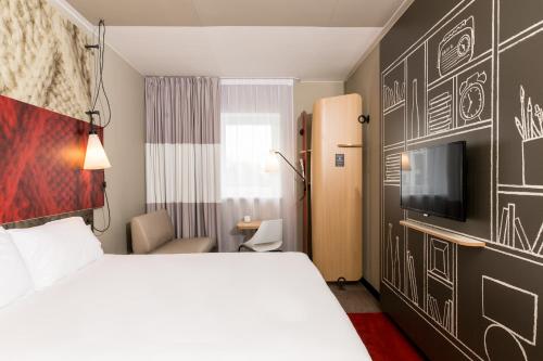 Postel nebo postele na pokoji v ubytování ibis Vilnius Centre