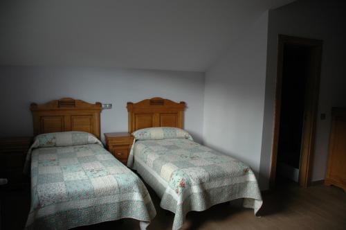 Ένα ή περισσότερα κρεβάτια σε δωμάτιο στο Apartamentos Torremar