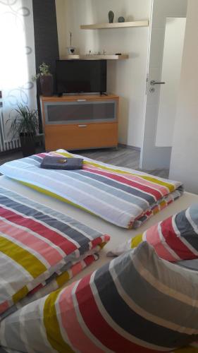 Schrammi's Ferienwohnungにあるベッド