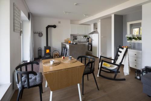Η κουζίνα ή μικρή κουζίνα στο Apartamenty Pluszne