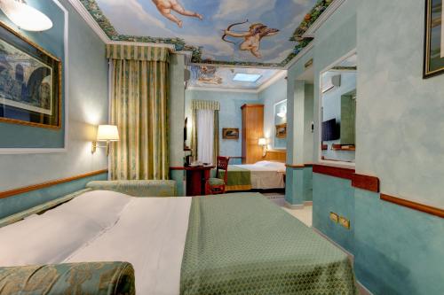 Katil atau katil-katil dalam bilik di Hotel Amalfi