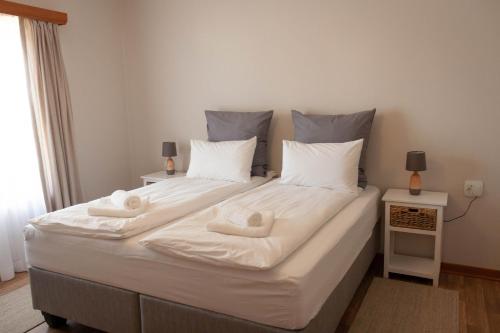 Katil atau katil-katil dalam bilik di Kramersdorf Guesthouse