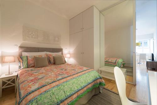 BmyGuest - Villa Lóios Terrace Apartmentにあるベッド