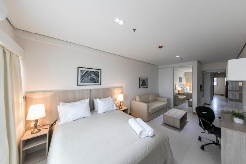 Postel nebo postele na pokoji v ubytování Asuncion Rent Suites Centro