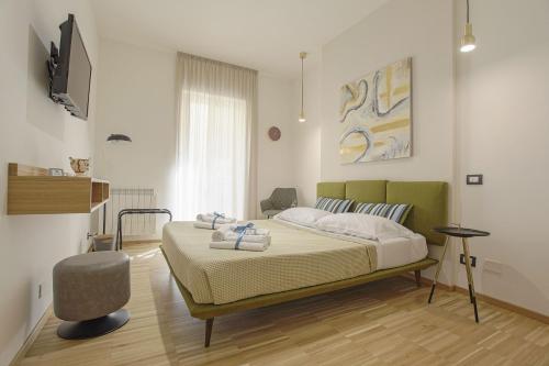 מיטה או מיטות בחדר ב-Casa Tita