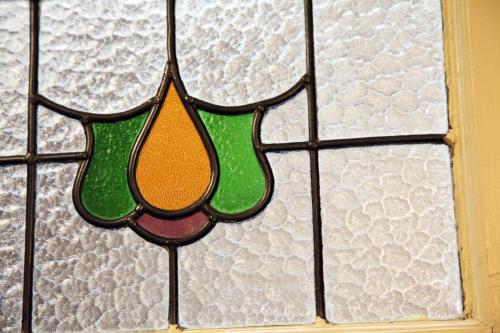 a stained glass window on a door at Albergo Allegria Hotel & Breakfast Restaurant in Windham