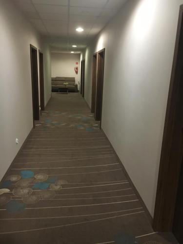 a corridor of a room with at Apart Promenada Gwiazd in Międzyzdroje