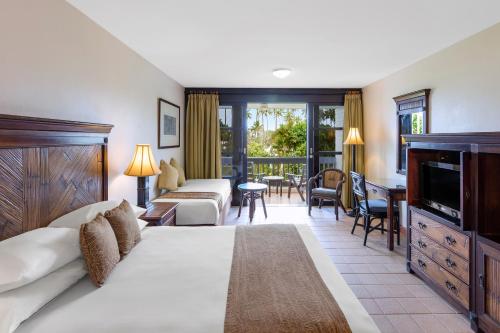 Llit o llits en una habitació de The Naviti Resort